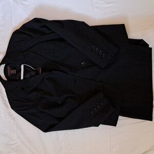 Black and gray pinstripe business suit